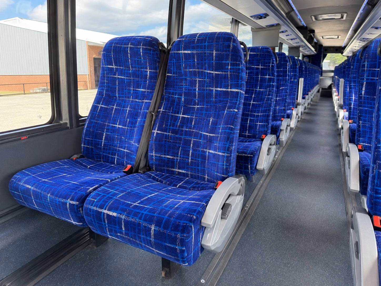 charter bus shuttles for rock island arsenal and quad cities military personnel